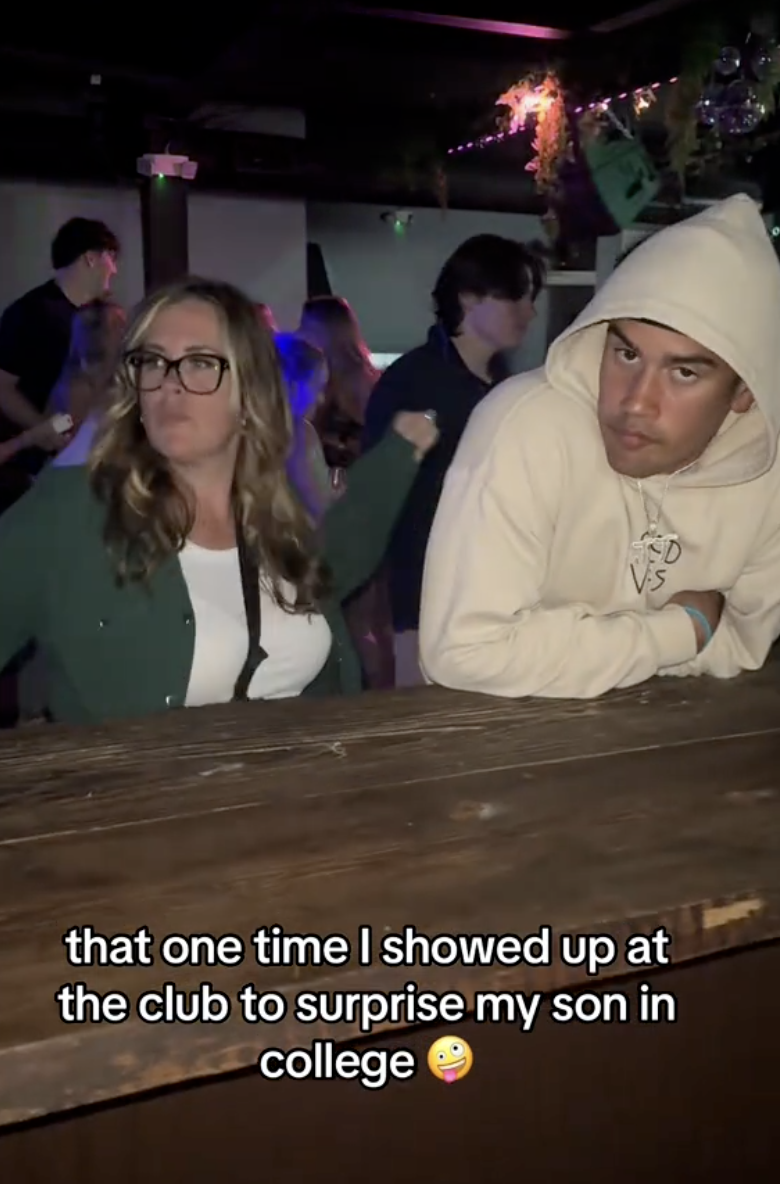 woman at a bar with her son